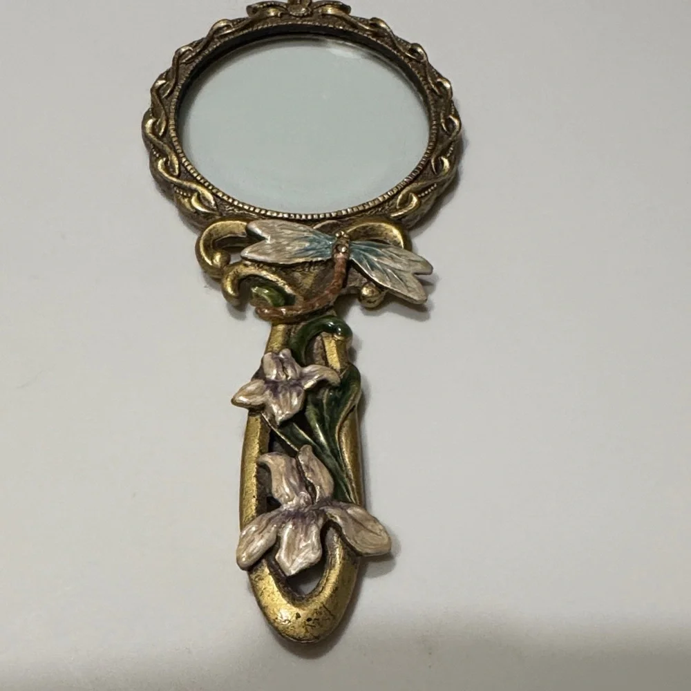 Vintage Handheld Magnifier glass with two intricate Floral Designs